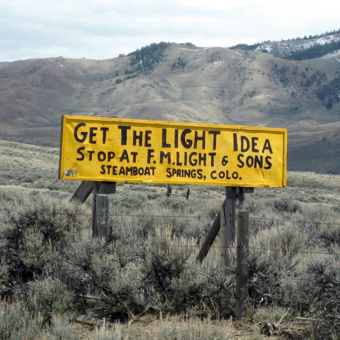 FM Light & Son Sign