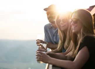 Off-beat Happy Hours 2024 people enjoying happy hour at the top of the Steamboat Springs gondola